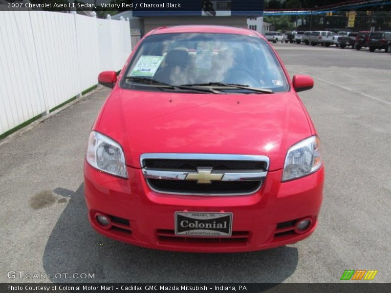 Victory Red / Charcoal Black 2007 Chevrolet Aveo LT Sedan