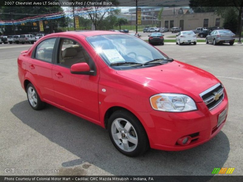 Victory Red / Charcoal Black 2007 Chevrolet Aveo LT Sedan