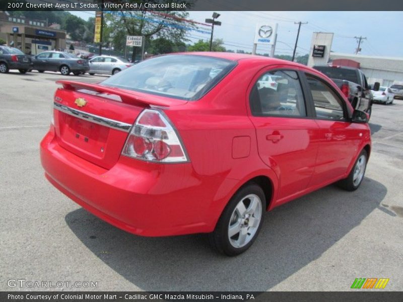 Victory Red / Charcoal Black 2007 Chevrolet Aveo LT Sedan