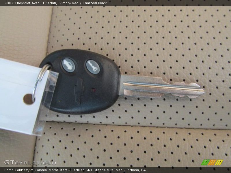 Victory Red / Charcoal Black 2007 Chevrolet Aveo LT Sedan