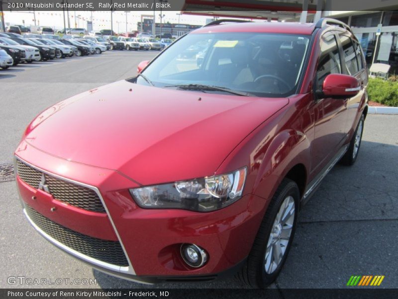 Rally Red Metallic / Black 2010 Mitsubishi Outlander SE