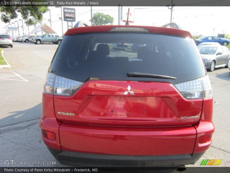 Rally Red Metallic / Black 2010 Mitsubishi Outlander SE
