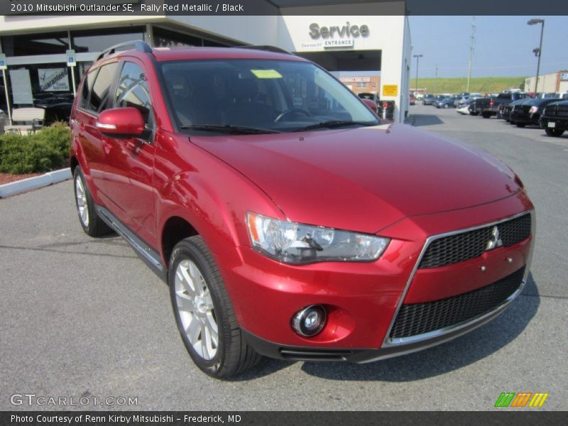 Rally Red Metallic / Black 2010 Mitsubishi Outlander SE