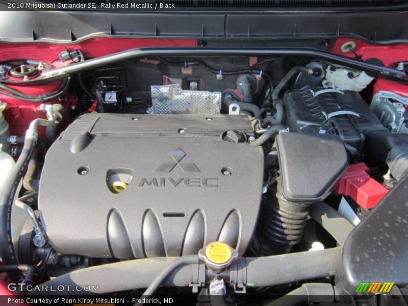 Rally Red Metallic / Black 2010 Mitsubishi Outlander SE