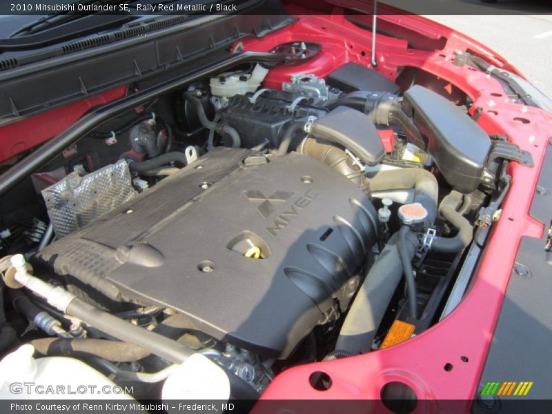 Rally Red Metallic / Black 2010 Mitsubishi Outlander SE