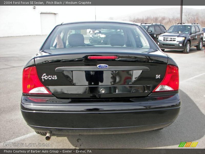 Pitch Black / Medium Graphite 2004 Ford Focus SE Sedan