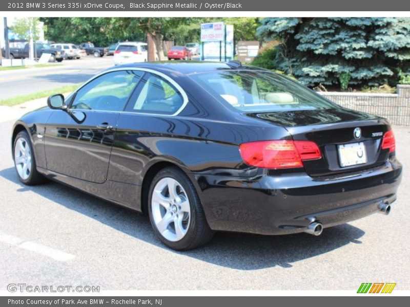 Black Sapphire Metallic / Oyster/Black 2012 BMW 3 Series 335i xDrive Coupe