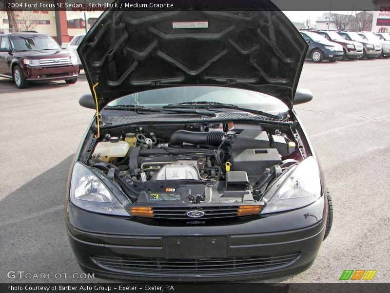 Pitch Black / Medium Graphite 2004 Ford Focus SE Sedan