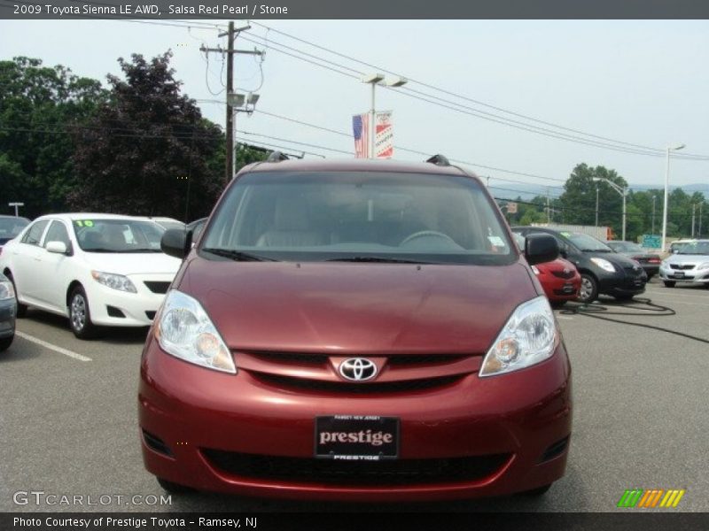 Salsa Red Pearl / Stone 2009 Toyota Sienna LE AWD