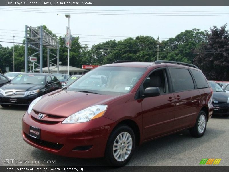 Salsa Red Pearl / Stone 2009 Toyota Sienna LE AWD