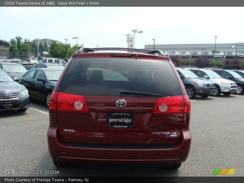 Salsa Red Pearl / Stone 2009 Toyota Sienna LE AWD