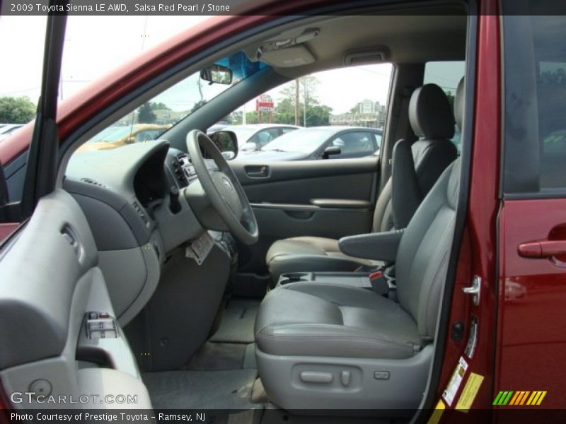 Salsa Red Pearl / Stone 2009 Toyota Sienna LE AWD