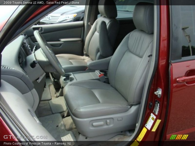 Salsa Red Pearl / Stone 2009 Toyota Sienna LE AWD