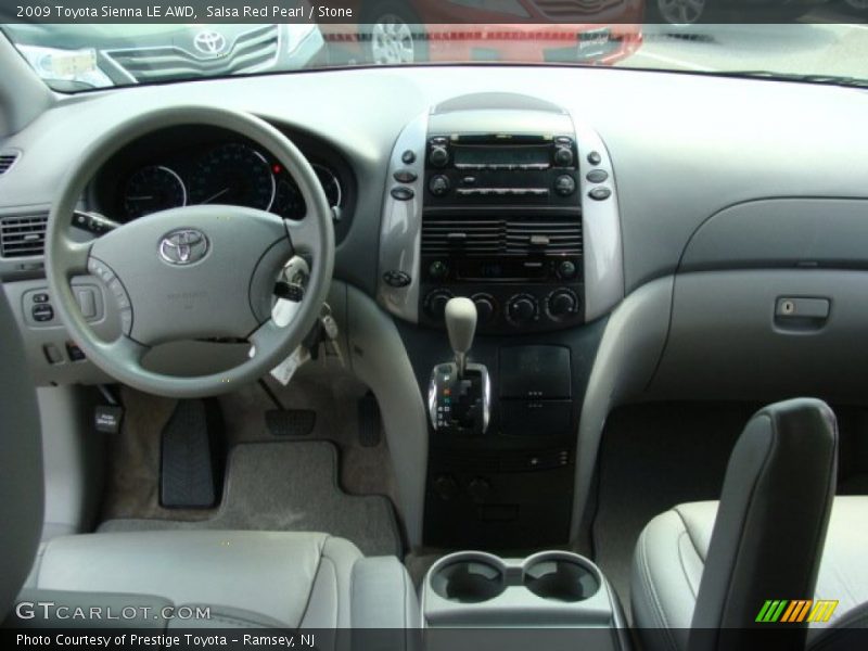 Salsa Red Pearl / Stone 2009 Toyota Sienna LE AWD