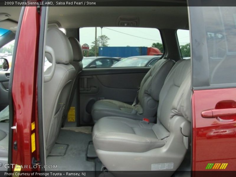 Salsa Red Pearl / Stone 2009 Toyota Sienna LE AWD