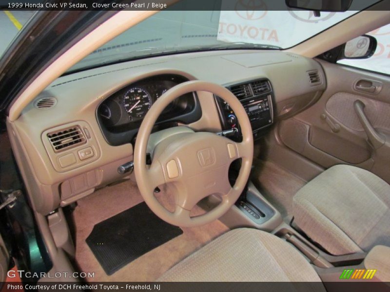 Clover Green Pearl / Beige 1999 Honda Civic VP Sedan