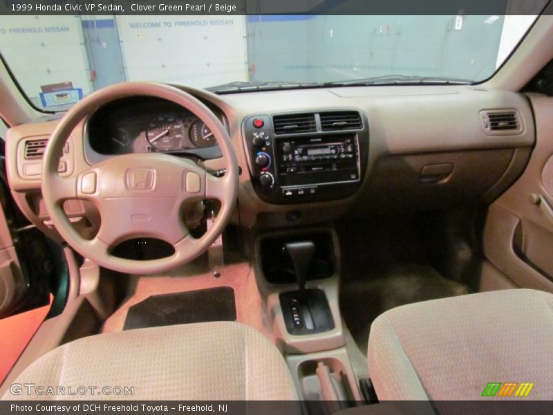 Clover Green Pearl / Beige 1999 Honda Civic VP Sedan