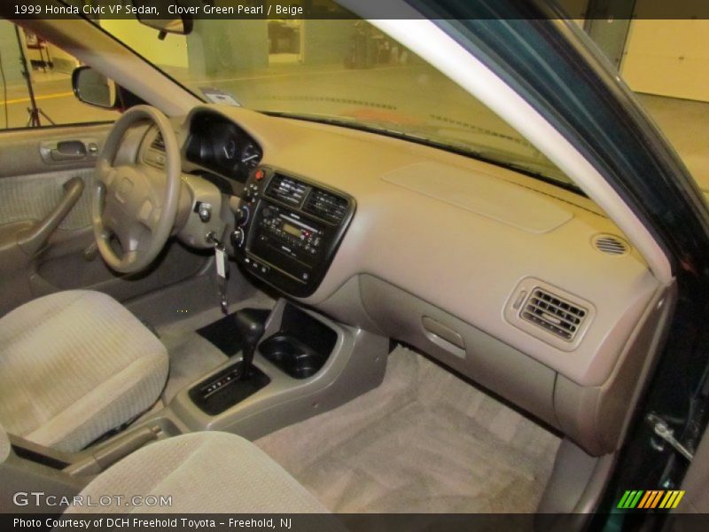 Clover Green Pearl / Beige 1999 Honda Civic VP Sedan