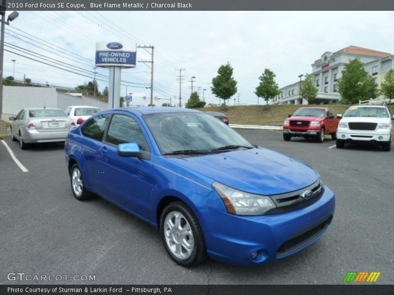 Blue Flame Metallic / Charcoal Black 2010 Ford Focus SE Coupe