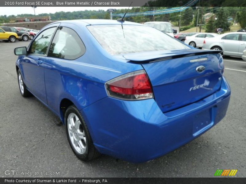 Blue Flame Metallic / Charcoal Black 2010 Ford Focus SE Coupe