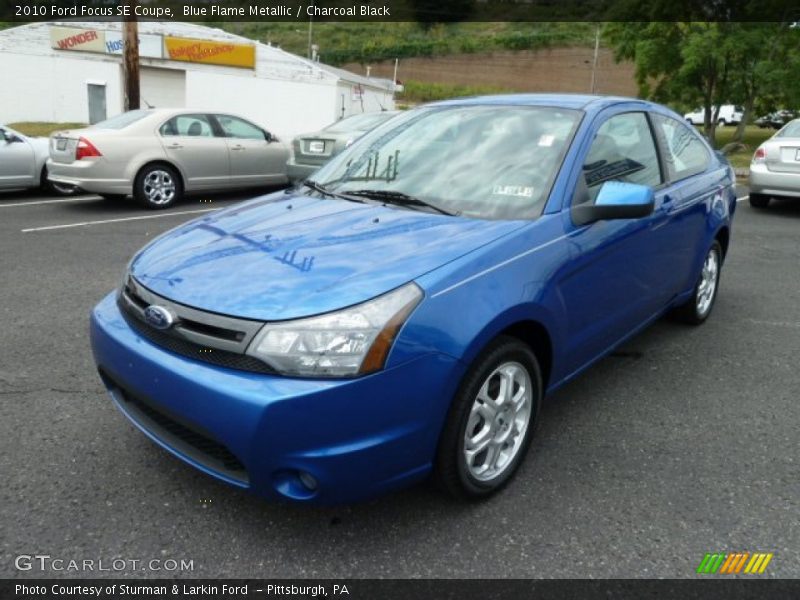 Blue Flame Metallic / Charcoal Black 2010 Ford Focus SE Coupe