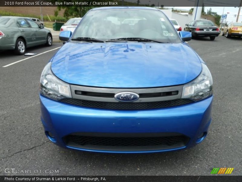 Blue Flame Metallic / Charcoal Black 2010 Ford Focus SE Coupe