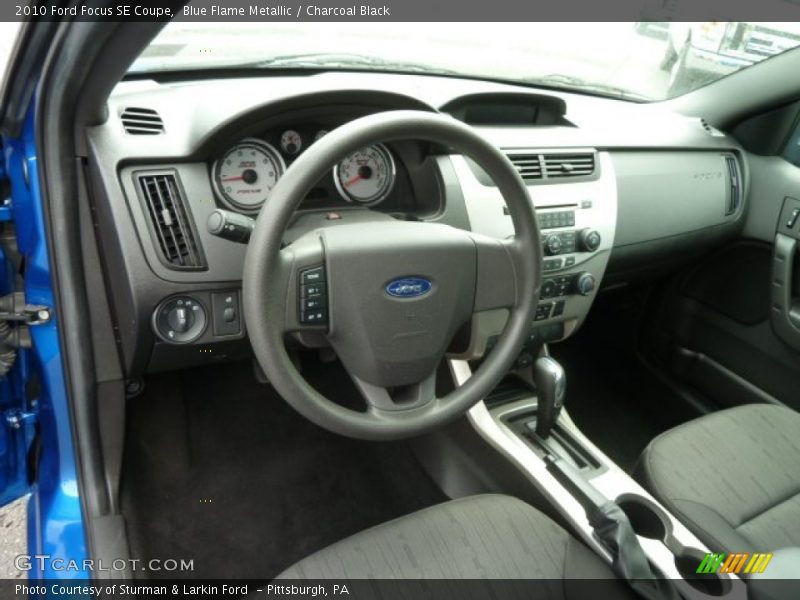Blue Flame Metallic / Charcoal Black 2010 Ford Focus SE Coupe