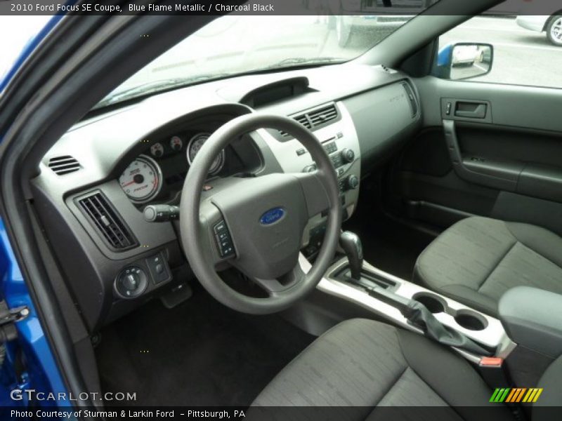 Blue Flame Metallic / Charcoal Black 2010 Ford Focus SE Coupe