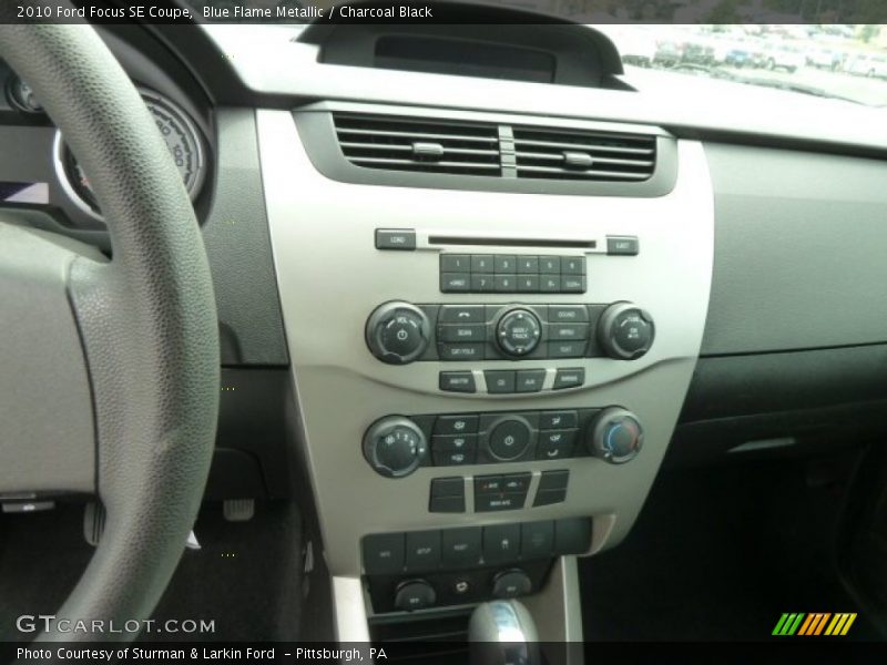 Blue Flame Metallic / Charcoal Black 2010 Ford Focus SE Coupe