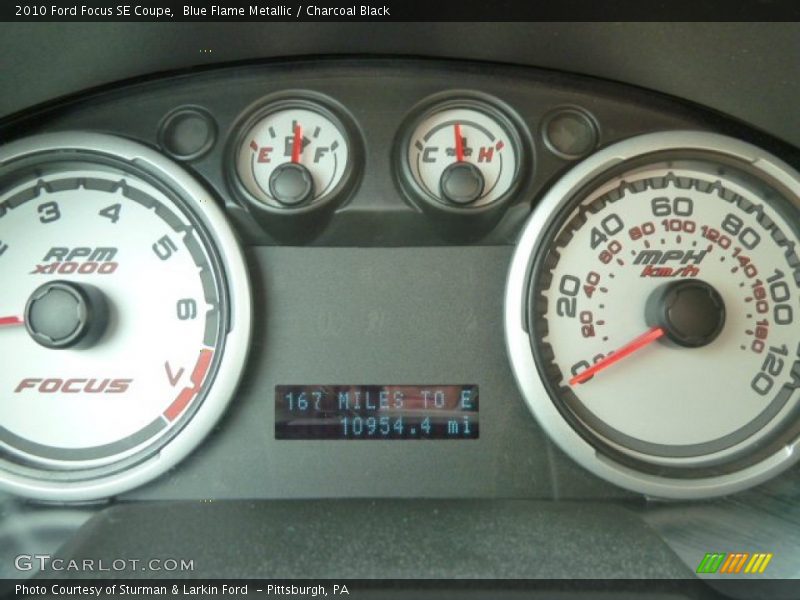 Blue Flame Metallic / Charcoal Black 2010 Ford Focus SE Coupe
