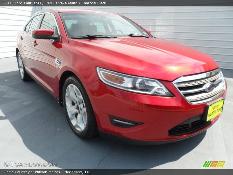 Red Candy Metallic / Charcoal Black 2010 Ford Taurus SEL