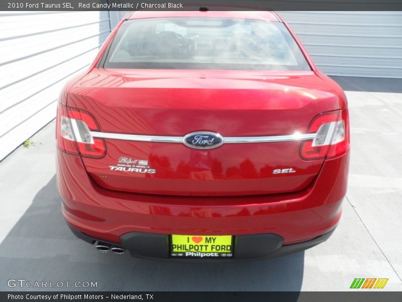 Red Candy Metallic / Charcoal Black 2010 Ford Taurus SEL