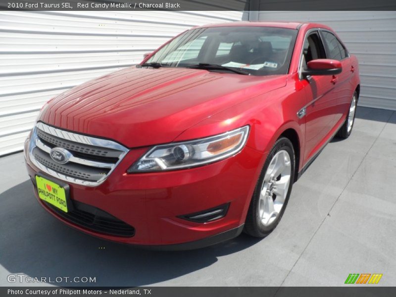 Red Candy Metallic / Charcoal Black 2010 Ford Taurus SEL