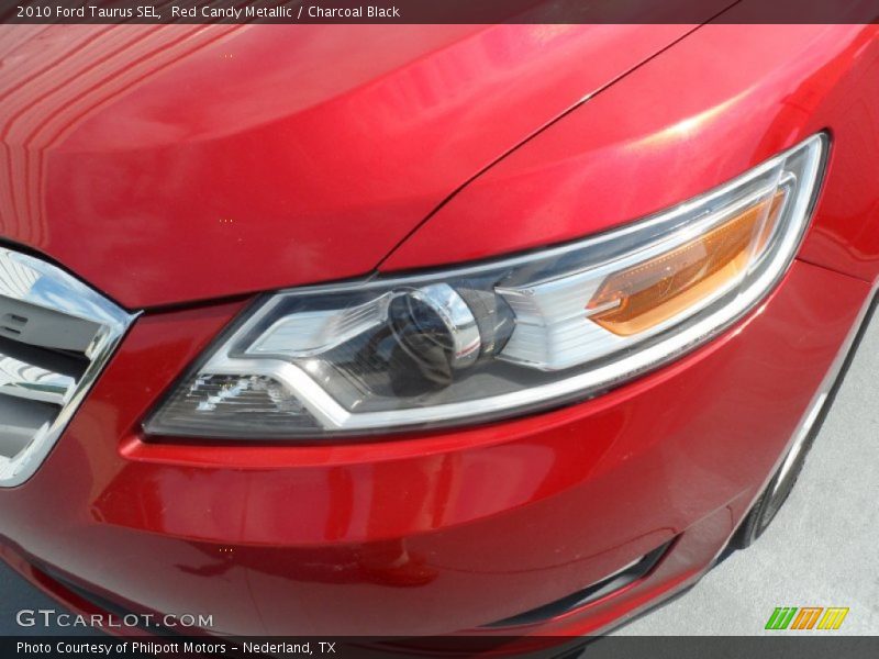 Red Candy Metallic / Charcoal Black 2010 Ford Taurus SEL