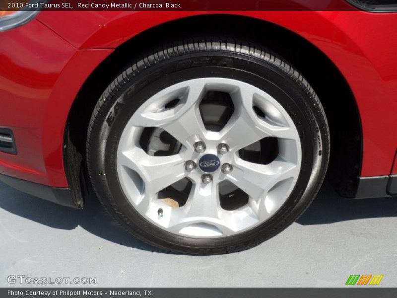 Red Candy Metallic / Charcoal Black 2010 Ford Taurus SEL