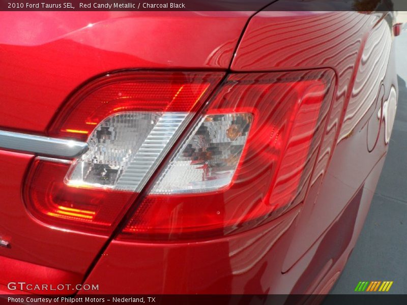 Red Candy Metallic / Charcoal Black 2010 Ford Taurus SEL