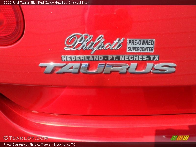 Red Candy Metallic / Charcoal Black 2010 Ford Taurus SEL