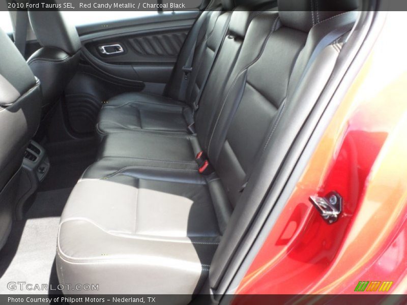 Red Candy Metallic / Charcoal Black 2010 Ford Taurus SEL