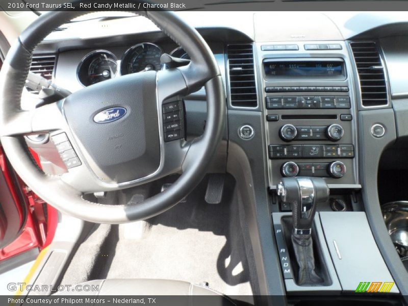 Red Candy Metallic / Charcoal Black 2010 Ford Taurus SEL