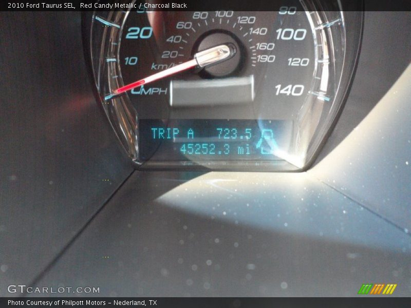 Red Candy Metallic / Charcoal Black 2010 Ford Taurus SEL
