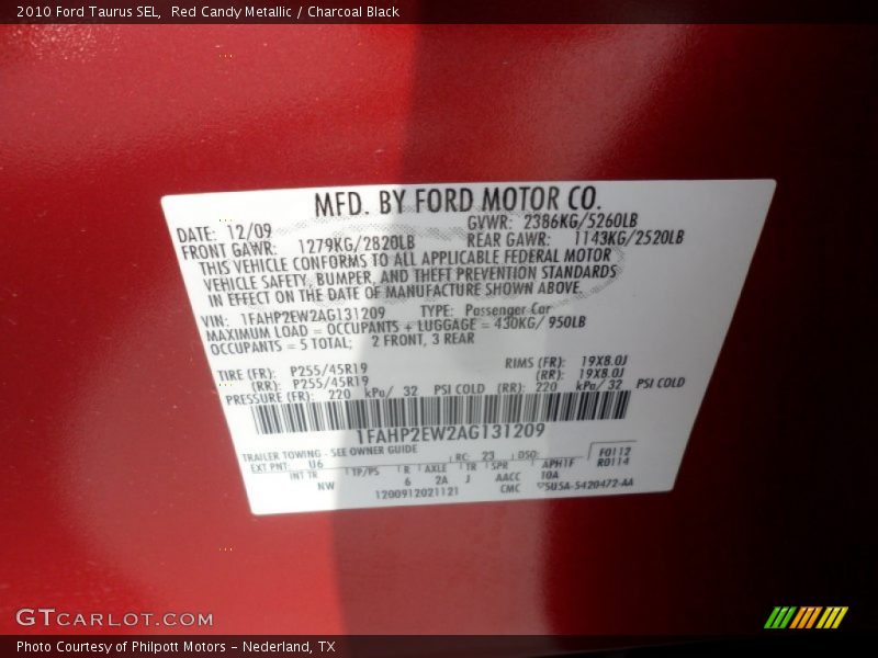 Red Candy Metallic / Charcoal Black 2010 Ford Taurus SEL