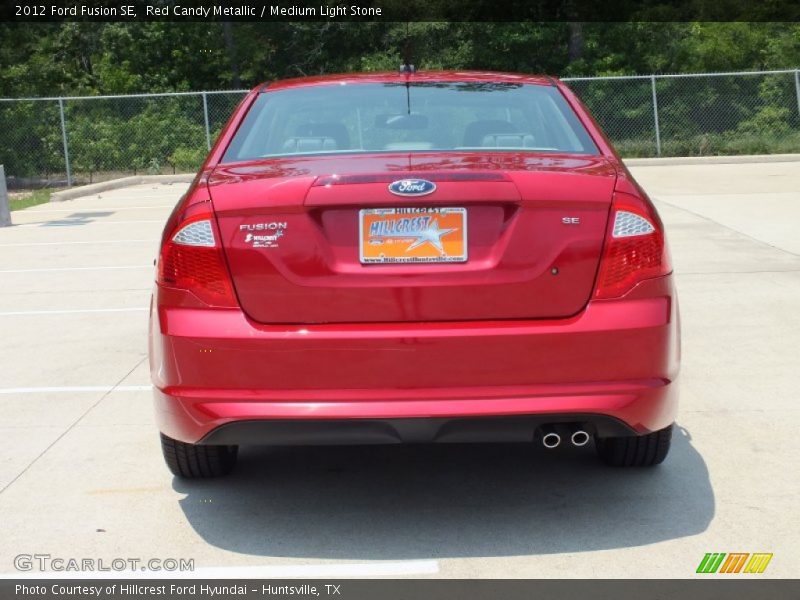 Red Candy Metallic / Medium Light Stone 2012 Ford Fusion SE