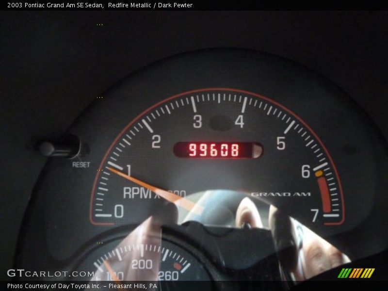 Redfire Metallic / Dark Pewter 2003 Pontiac Grand Am SE Sedan