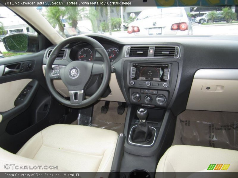 Toffee Brown Metallic / Cornsilk Beige 2011 Volkswagen Jetta SEL Sedan