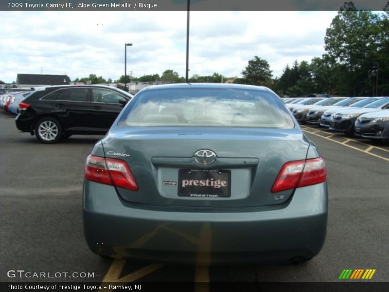 Aloe Green Metallic / Bisque 2009 Toyota Camry LE