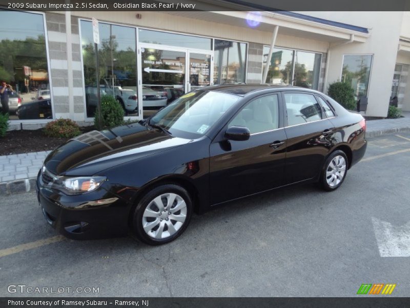 Obsidian Black Pearl / Ivory 2009 Subaru Impreza 2.5i Sedan