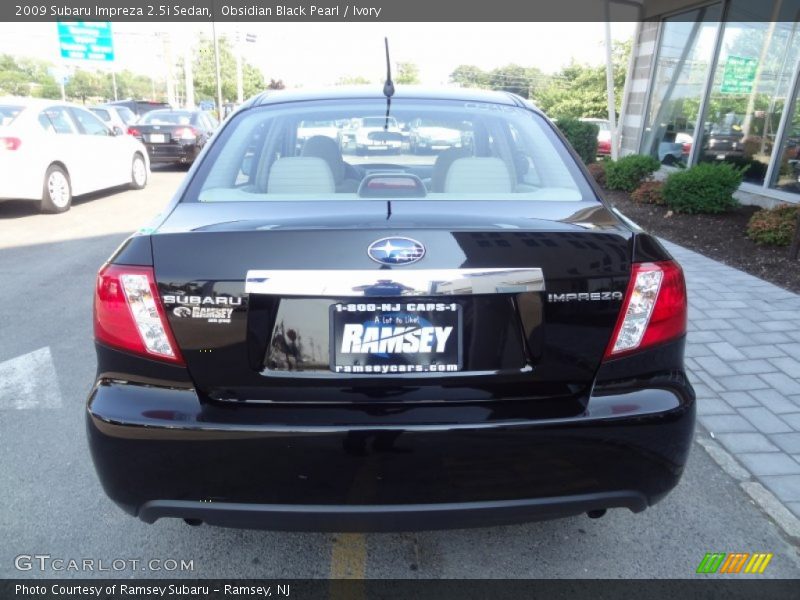 Obsidian Black Pearl / Ivory 2009 Subaru Impreza 2.5i Sedan