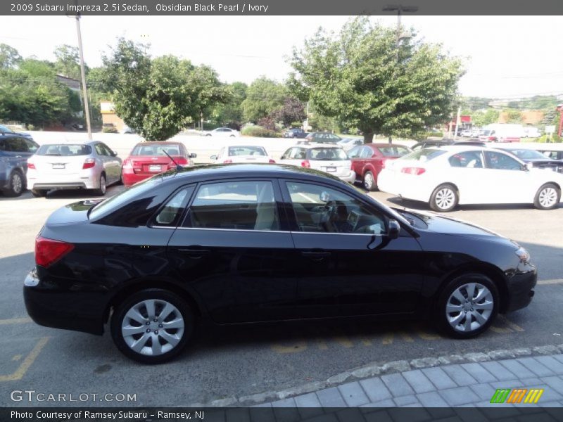 Obsidian Black Pearl / Ivory 2009 Subaru Impreza 2.5i Sedan