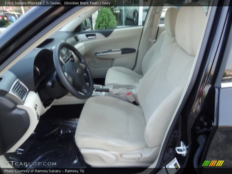 Obsidian Black Pearl / Ivory 2009 Subaru Impreza 2.5i Sedan