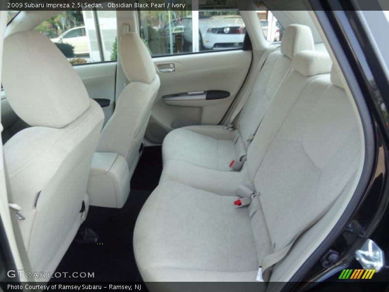 Obsidian Black Pearl / Ivory 2009 Subaru Impreza 2.5i Sedan
